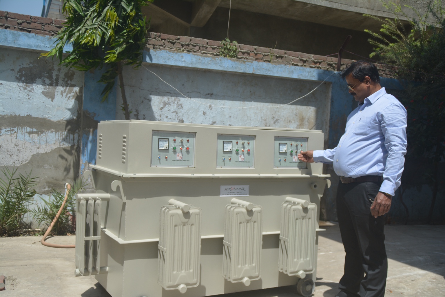 Founder Hemant Kumar Rout checking the control panel before dispatch in 2000